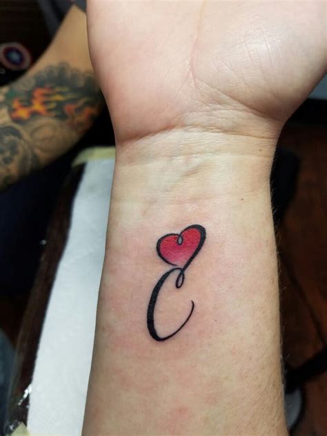 "C" tattoo with heart | C tattoo, Love heart tattoo, Olive tattoo