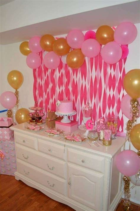 Pretty balloon and crepe paper backdrop at a Pink and gold girl birthday party ! See more party ...