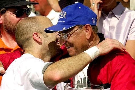 Andre Agassi hugs his dad, Mike Agassi, after defeating Juan Balcells ...