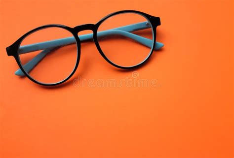 Top View and Close Up Round Black Eye Glasses on Orange Background Stock Photo - Image of ...
