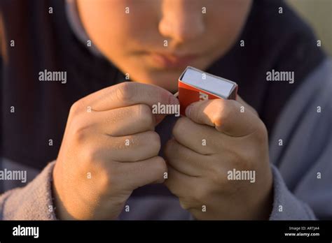 lighting a match Stock Photo - Alamy