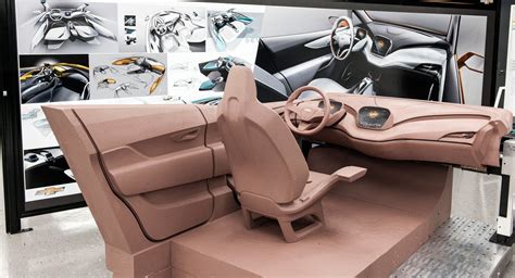 Chevrolet Bolt concept interior clay model surrounded by theme renders in GM's Austra… | Car ...