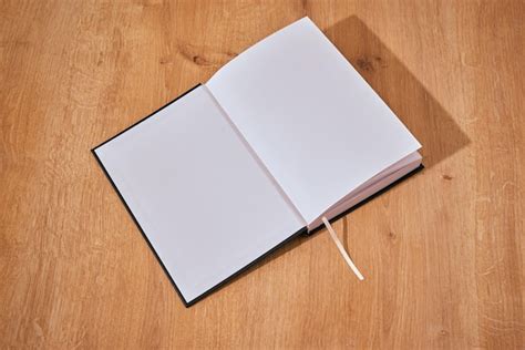 Premium Photo | New notebook with white pages and a black cover