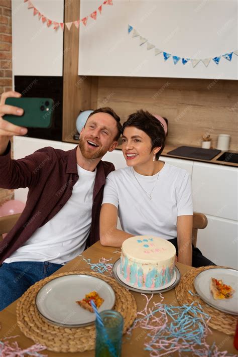 Free Photo | Smiley couple taking selfie medium shot