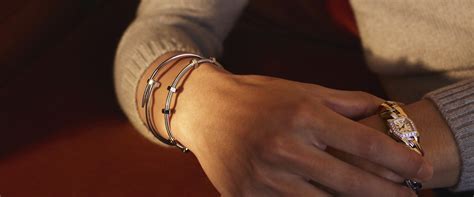 Luxury jewellery for men bracelets: white gold, ceramic, sapphire - Cartier
