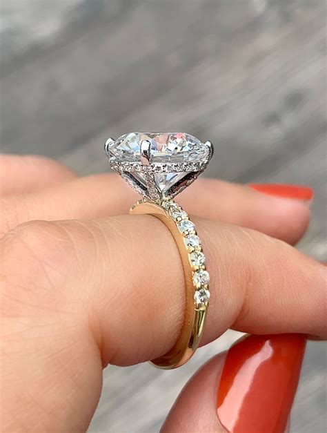 Two Tone Hidden Halo Engagement Ring | Hottest engagement rings, Trending engagement rings ...