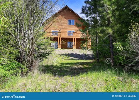 Large Cabin Style Home in the Woods with Lots of Greenery Stock Image - Image of fenced, garden ...