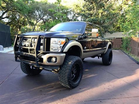 Awesome 2011 Ford F 250 King Ranch Crew Cab lifted for sale