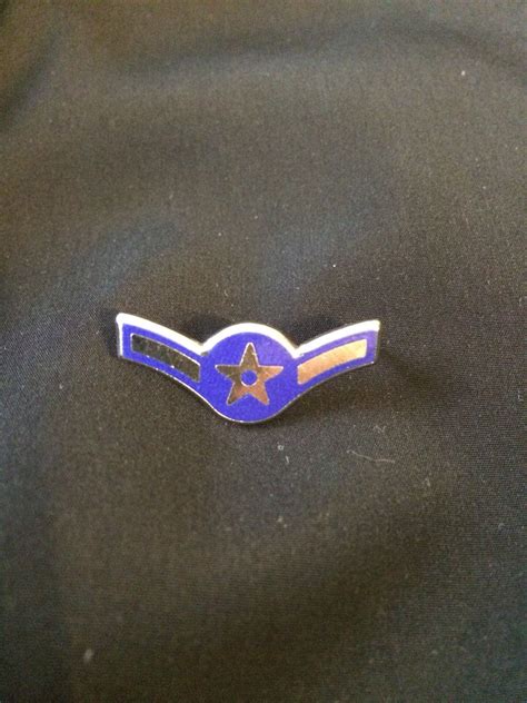 US Air Force Airman (E-2) metal rank insignia. | Military insignia, Military ranks, Airman