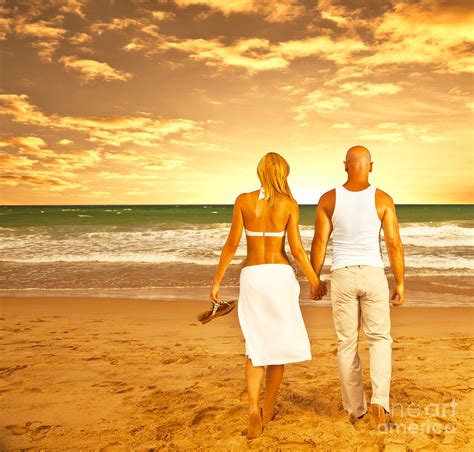 Happy Couple On The Beach Photograph by Anna Om