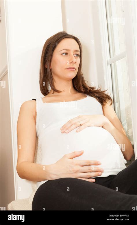 sad pregnant woman Stock Photo - Alamy