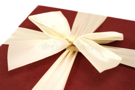 A Red Present Gift Box with Cream Beige Ribbon Bow Tie Closeup Stock Image - Image of bright ...
