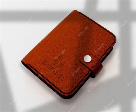 Premium PSD | Embossed logo mockup on a realistic leather wallet