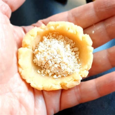 Traditional Kuih Makmur (Malay Peanut Filled Eid Cookies)