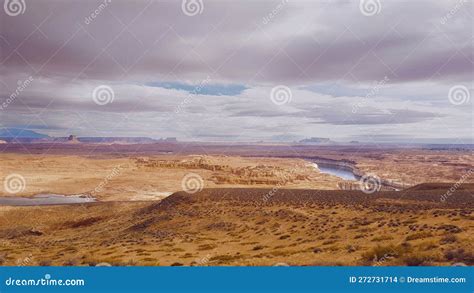 Arid Desert Landscape Featuring a Majestic Mountain Range and Stretches ...