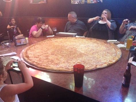 The massive 62 inch at Big Lou's Pizza | Typos courtesy of m… | Flickr