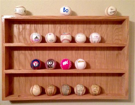 Baseball rack holds 28 balls | Floating shelves, Decor, Home decor