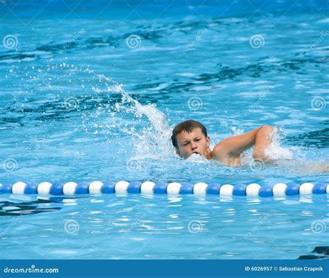 Boy swimming in pool stock image. Image of pool, lines - 6026957