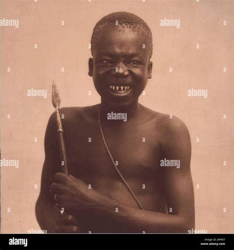 Ota Benga sharpened teeth and spear Stock Photo - Alamy