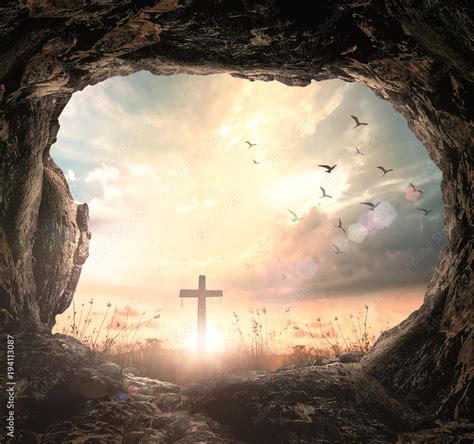 Resurrection of Easter Sunday concept: Empty tomb with cross symbol for ...