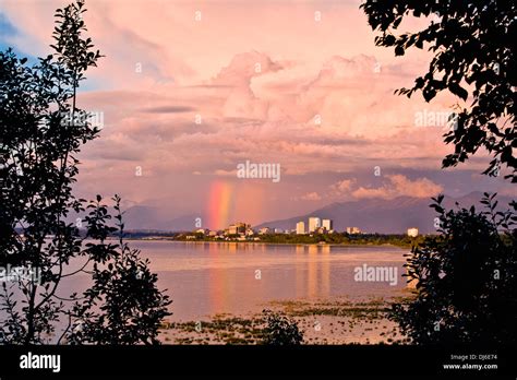 View Of Anchorage Skyline & Rainbow At Sunset Reflecting In Cook Inlet ...