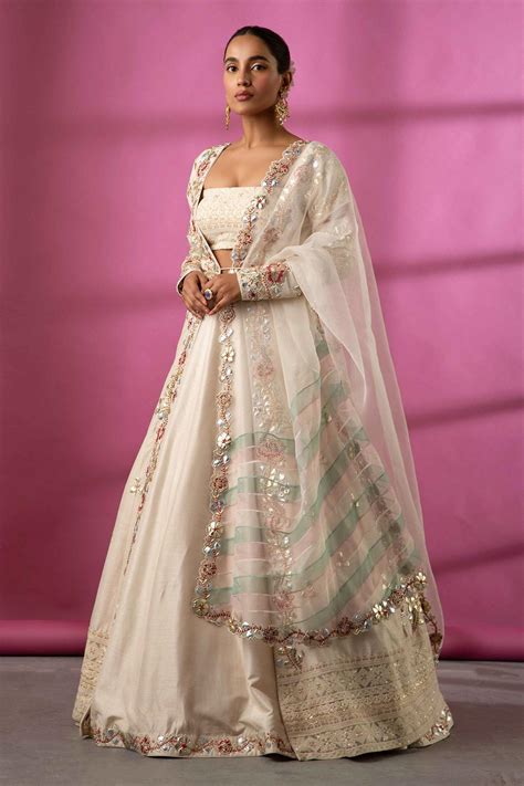 Buy White Raw Silk Embroidery V Neck Cape Lehenga Set For Women by Rachit Khanna Online at Aza ...