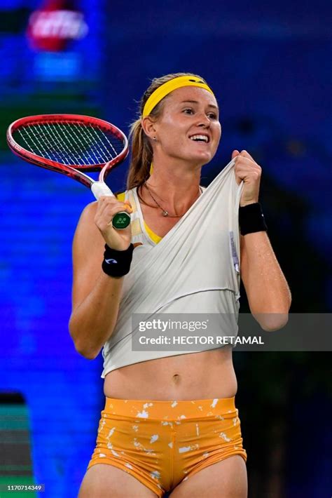 Marie Bouzkova of Czech Republic gestures while playing against Wang ...