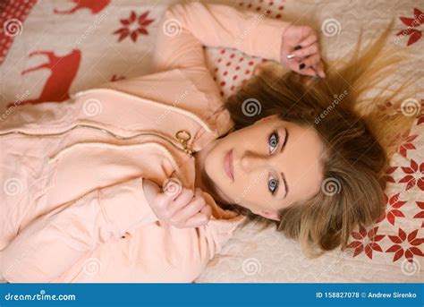 Beautiful Girl Lying on Her Back in Bed Stock Photo - Image of lying, relaxation: 158827078