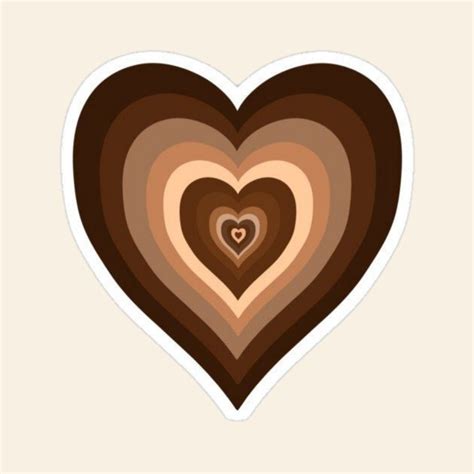 a heart shaped sticker in brown and beige