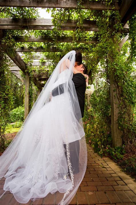 Gorgeous shot of a bride and groom at the Cape Fear Botanical Gardens. www.carolinamediastar.com ...