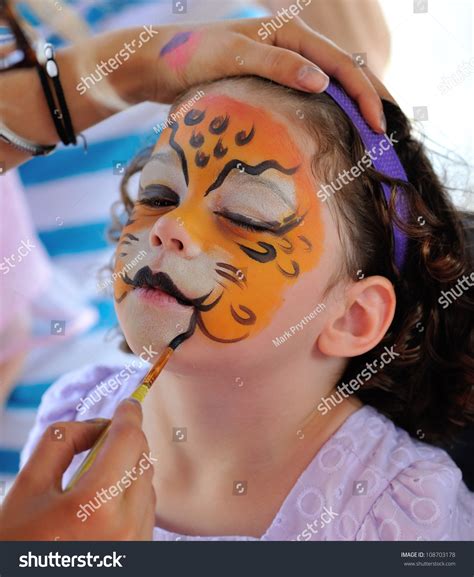 Pretty Girl With Face Painting Of A Jaguar Stock Photo 108703178 ...