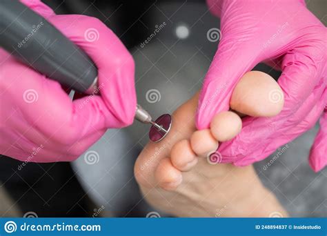 Woman on Professional Pedicure Procedure by Abrasive Disc Machine in Beauty Salon. Stock Image ...