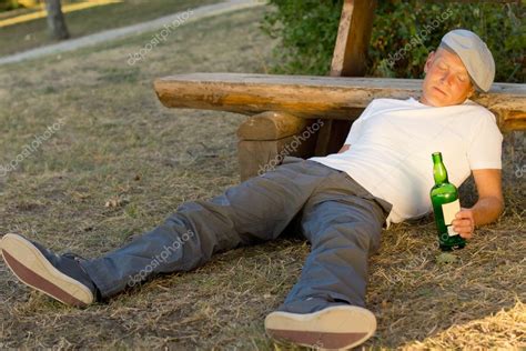 Drunk man fallen asleep on the ground ⬇ Stock Photo, Image by © Vaicheslav #30991219