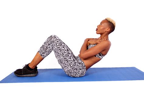Sporty Young Woman Doing Ab Crunches. Fitness Woman Doing Sit Ups