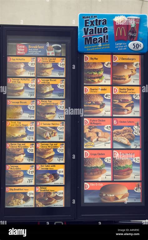 Menu display of a drive in and walk up McDonald s fast food restaurant USA April 2005 Stock ...