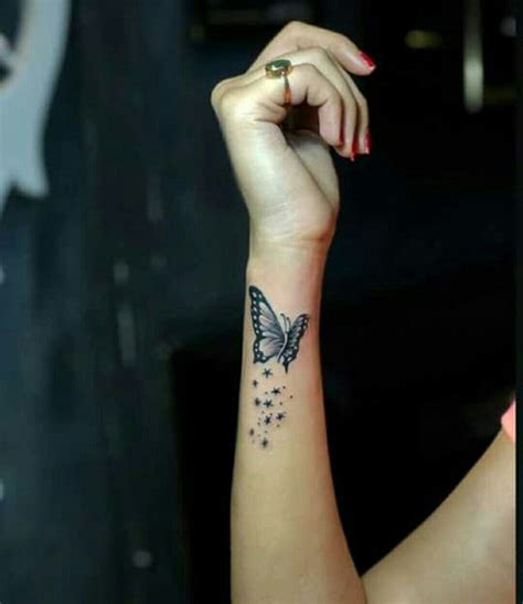 Butterfly tattoo for women Wrist tattoo | Wrist tattoos girls, Butterfly wrist tattoo, Side ...