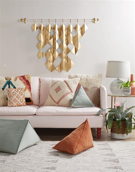 gold-wall-hanging-above-pink-sofa-371bda80 | Decor above couch, Diy ...