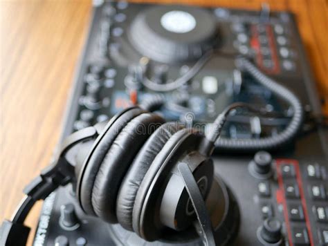 Electronic Dance Music Digital Audio Dj Gear with Knobs and Headphones at an Edm Festival. Stock ...