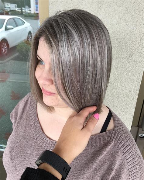 Added some grey highlights to help blend her natural grey hair ...