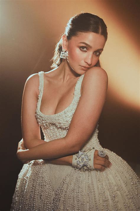 Alia Bhatt just made her Met Gala debut covered in pearls and wearing an edgy fingerless glove ...