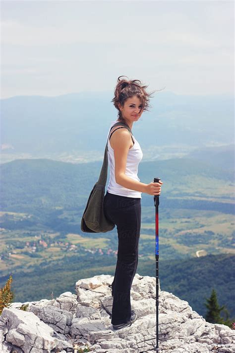 "Young Beautiful Woman Hiking In The Mountains In Summer" by Stocksy Contributor "Maja Topcagic ...