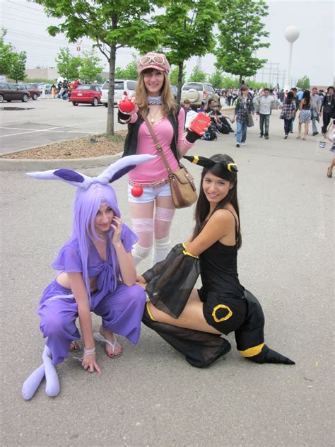 Espeon, Umbreon and trainer cosplay. I don't even... : pokemon