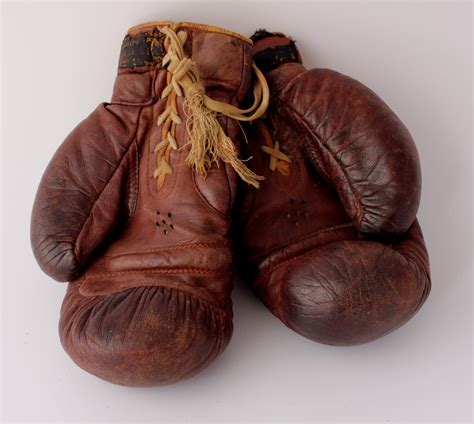 Vintage Berg Brown Leather Straw Filled Boxing Gloves. c1930.