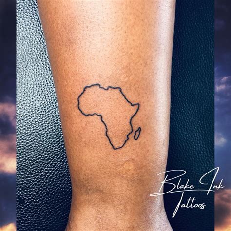 Africa outline in 2024 | Tattoos for black skin, Wrist tattoos for guys, Africa tattoos