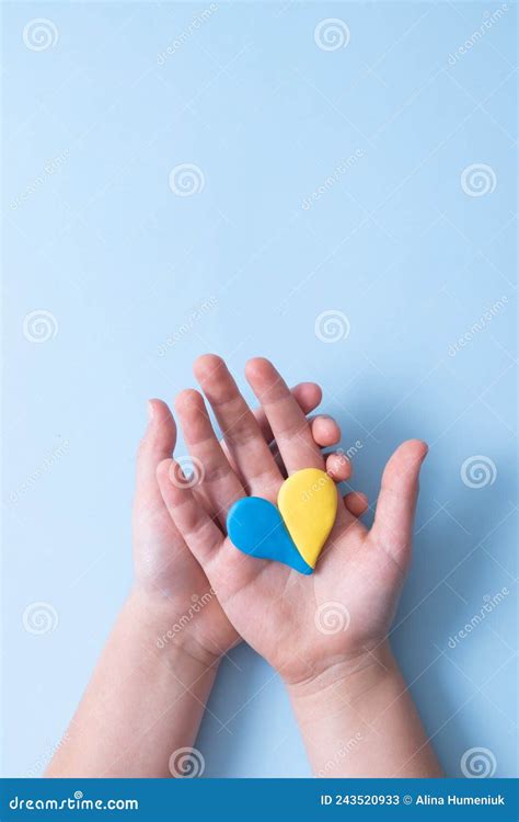 Heart of Yellow-blue Colors of the National Flag of Ukraine in a Childs Hands, Top View ...