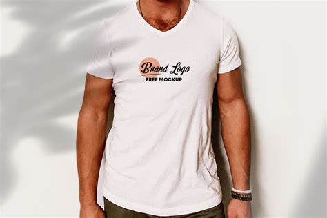 V-Neck T-shirt Mockup Featuring a Man Wearing it in the Front View ...