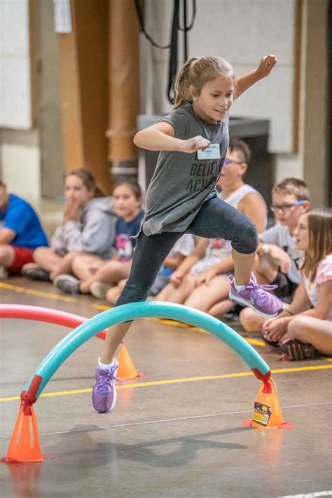 A camper participates in an agility obstacle course - NARA & DVIDS ...