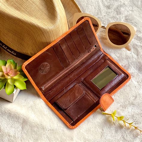 Women's Brown Leather Wallet at Virginia Martinez blog