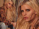 Jessica Simpson, 43, showcases full lips while modeling a crop top from her clothing collection ...