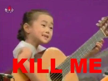 North Korean children playing guitar... what they're really thinking. (http://www.youtube.com ...